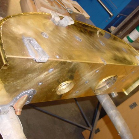 Test Fitting Top Section Of Emergency Fuel Tank Skin