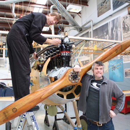 Roger Fits Exhaust While Ben Hugs The Plane